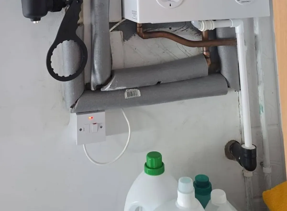 Magnetic filter and 22mm primary pipework on a newly installed central heating system in a Bromley house